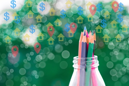 Color pencil in bottle with house and dollar currency vector on a blurred tree background in nature....