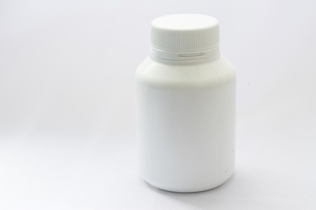 plastic bottle white on the white background. Using wallpaper for package work photo.の写真素材