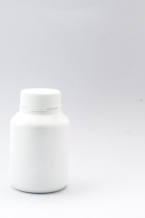 plastic bottle white on the white background. Using wallpaper for package work photo and isolated image.の写真素材