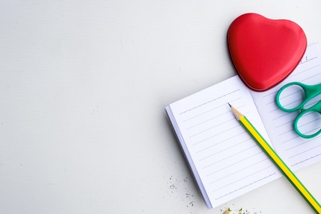 Notepad with pencil on wood board background. using wallpaper or background for education, business photo. Take note of the product for book with paper and concept or copy space.の写真素材