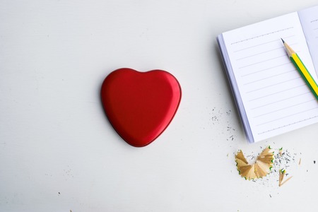 Notepad with pencil on wood board background. using wallpaper or background for education, business photo. Take note of the product for book with paper and concept or copy space.の写真素材