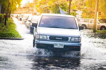 BANGSAN, THAILAND - September , 2017 Car is flooding on street in capital of thailand.のeditorial素材