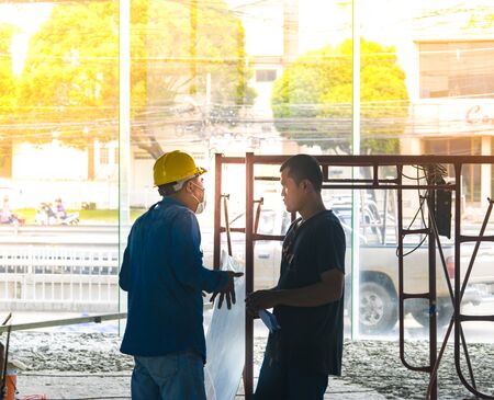 BANGSAN, THAILAND - September , 2017 :  Foreman is explaining the construction process.In the industry of thailand.のeditorial素材