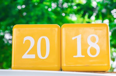 Box number 2018 on bokeh tree blurred background. using wallpaper or background for object of happy new year image.の写真素材
