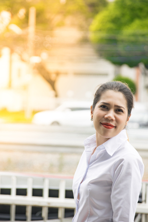 Asian women for life insurance image.To the hospital and everyone on a office background.  Using life insurance or Health Care and business.の写真素材