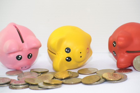 Pork piggy bank with coin on white background for happy new year image. And welcome new year photo.の写真素材