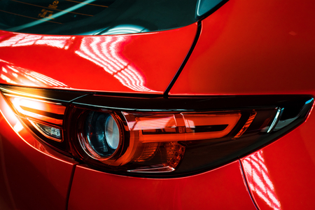 Car tail light red color for customers. Using wallpaper or background for transport and automotive imageの写真素材
