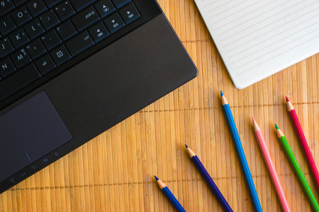 notepad, pencil with notebook on wood board background.using wallpaper for education, business photo.Take note of the product for book with paper and concept, object or copy space.の写真素材