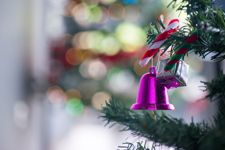 Christmas tree with leaf christmas and gift box on tree bokeh background. Using wallpaper or background for happy new year 2018 image.の写真素材