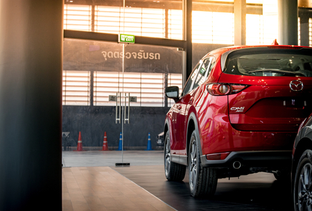 BANGSAN, THAILAND - JANUARY 4, 2018 :  This car all new cx 5 mazda brand japan gray color on room customer backbround parked in showroom of thailand for transport editorial mage.のeditorial素材