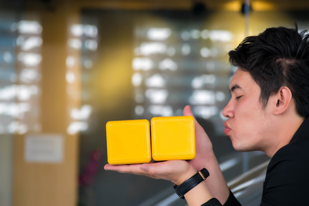 Asian man with customer service blurred background.Using life insurance or Health, business or welcome photo and lifestyle imageの写真素材