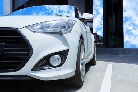 Led headlight oto white car for customers on sky background for transport and automotive automobile image.の写真素材