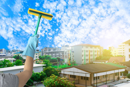 Female cleaning staff all houses and Buildings to bathroom blurry background Metaphor for cleaning Get rid of germs In bathroom, home office.For reliability And satisfaction of service and customers.の写真素材