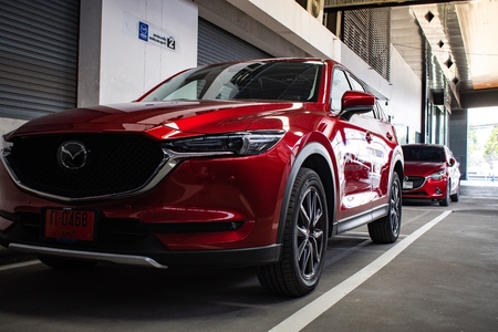 BANGSAN, THAILAND MAY 2018 :  This car all new cx 5 mazda brand japan red color on parking street for customer so parked in showroom of thailand for transport automotive automobile Illustrative editorial image.のeditorial素材