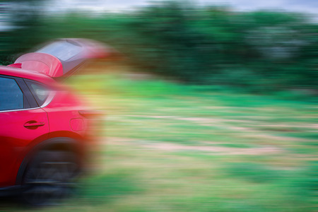 Car on street blurry background.For automotive automobile or transport transportation image.の写真素材