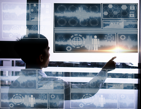 Businessman finger pointing in technology blue room lab data radar polar scan andwriting technology...