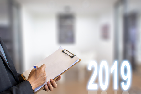 Businessman wearing suit blurred home background.metaphor to business 
in development, success, entrepreneur or employment and advertising 
image.の写真素材