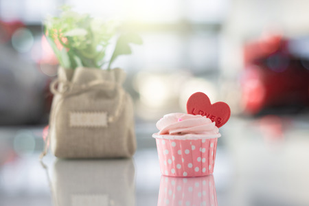 pink cake sweet homemade pastel color on bokeh blurred background for birthday party valentines or wedding bakery imageの写真素材