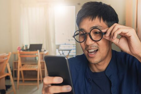 man holding tablet on blurred city background for e-shopping marketing digital, consumer purchase shopping internet online imageの写真素材