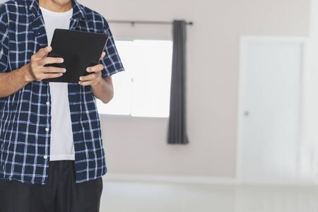 Asian man business marketing The developer creative working online work from home or asian male portrait lifestyle payment price e-commerce shopping online in honeの写真素材