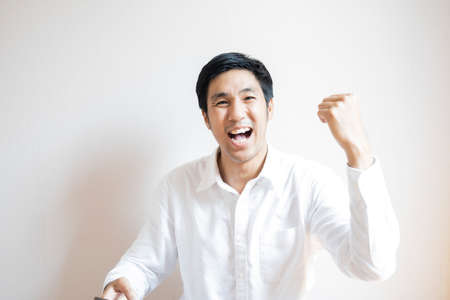 Asian man portrait confident teen studen lifestyle people For business insurance, salesman, finance, lifestyle and businessman portrait people communication imageの写真素材