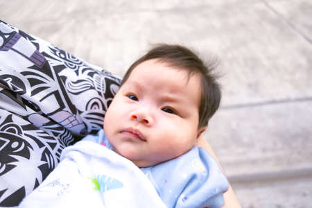 Asian mom carry infant or baby child babe child childhood so cute in home family Pictures for...