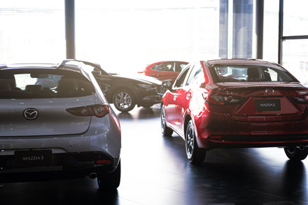 BANGSAEN THAILAND MAR 2022 This car mazda 3 brand japan stock car garage dealership on room customer parked in showroom of thailand for Illustrative editorial image.のeditorial素材