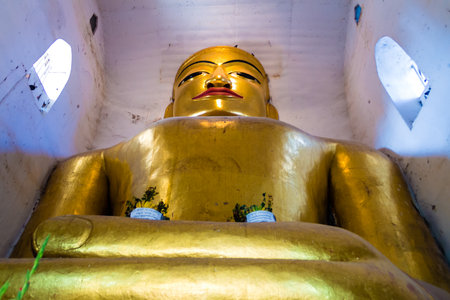 Buddha image at Manuha Temple ,  Bagan in Myanmar  Burmar のeditorial素材