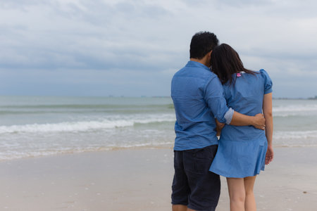 Couple on the beautiful beach , Hua Hin in Thailandの写真素材
