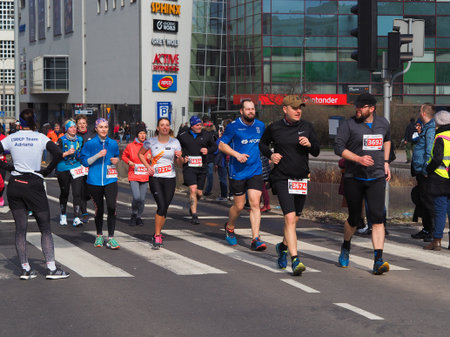 Gdynia / Poland-March 17.2019 Runners on the route of the half marathon in Gdyniaのeditorial素材