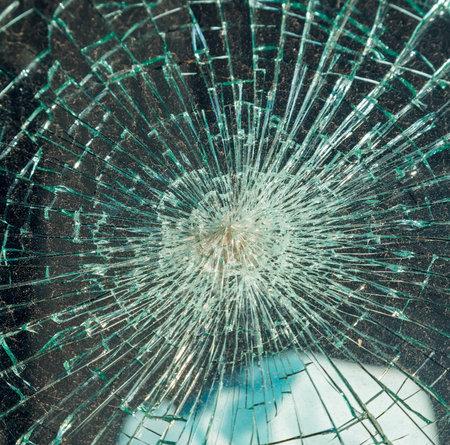 Close up photo of a broken windshieldの写真素材