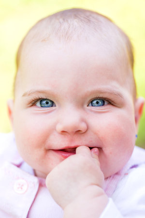 Portrait of an adorable few months old babyの写真素材