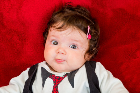 Portrait of adorable few months old babyの写真素材