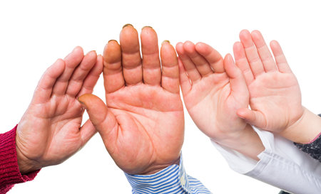 Close up photo of many hands togetherの写真素材