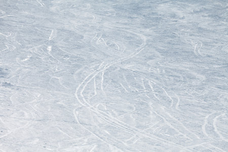 Photo of ski trails on ski slopeの写真素材
