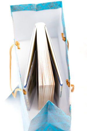 Photo of a book in a paper bag