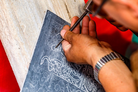 Close up photo of craftsman hands workingの写真素材