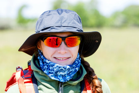 Close up photo of smiling hiker young  woman