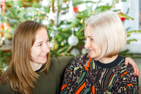 Photo of happy elderly woman and her daughterの写真素材