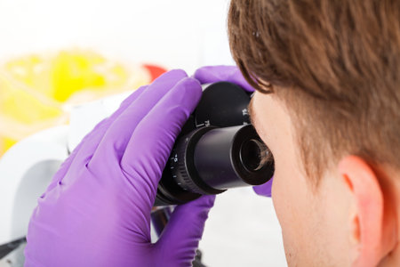 Photo of young scientist working in laboratoryの写真素材