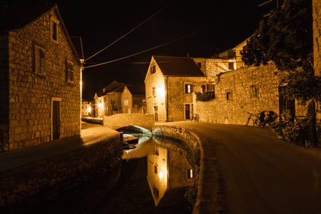 Landscape photo of mediterranean town at nightの写真素材