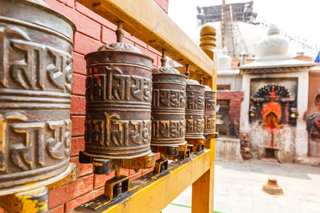 Prayer wheels at Boudhanath stupa in Kathmanduの写真素材