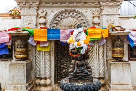 Statue of Buddha manifestations at the entrance to Boudhanath stupaの写真素材
