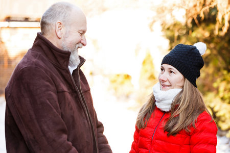 Smiling handsome elderly man with the young carerの写真素材