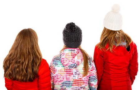 Photo of three young girl on isolated white backgroundの写真素材