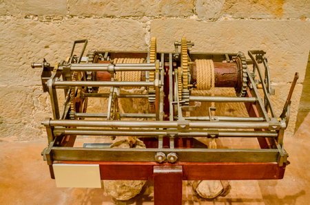 Old winding golden watch with the mechanism in sightの写真素材