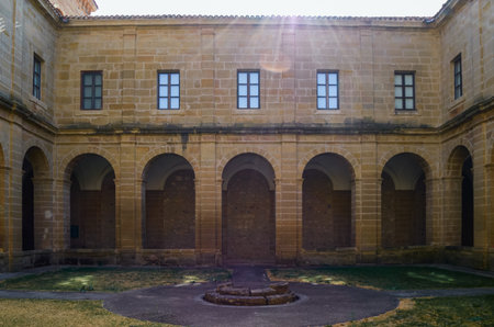 Courtyard of the monastery of Santo Domingo de la Calzada with aisles between columns.の写真素材