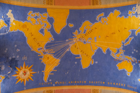 large antique map of the world in yellow and blue