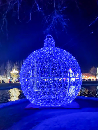 Giant christmas ball illuminated blue at night in torrejon de ardoz christmas decoration, madrid, spainの写真素材