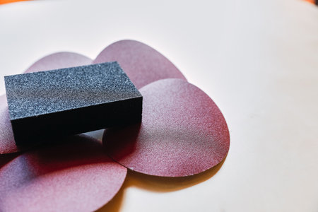 Close-up Round and scouring pad sandpaper for woodworking with copyspaceの写真素材
